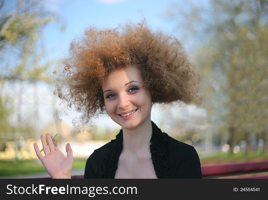 Pretty Curly Posing In Park