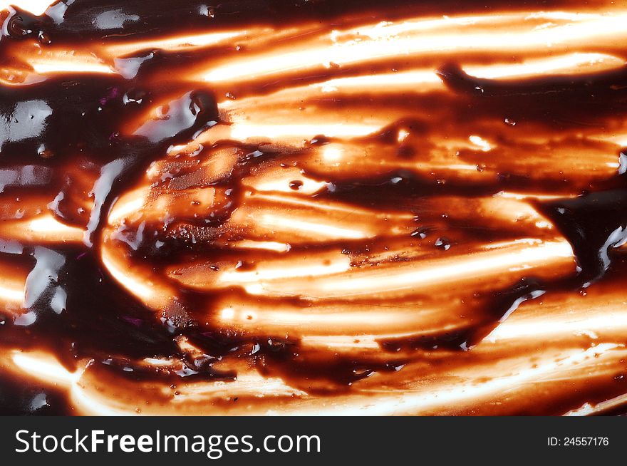 Abstract brown chocolate creamy background closeup. Abstract brown chocolate creamy background closeup