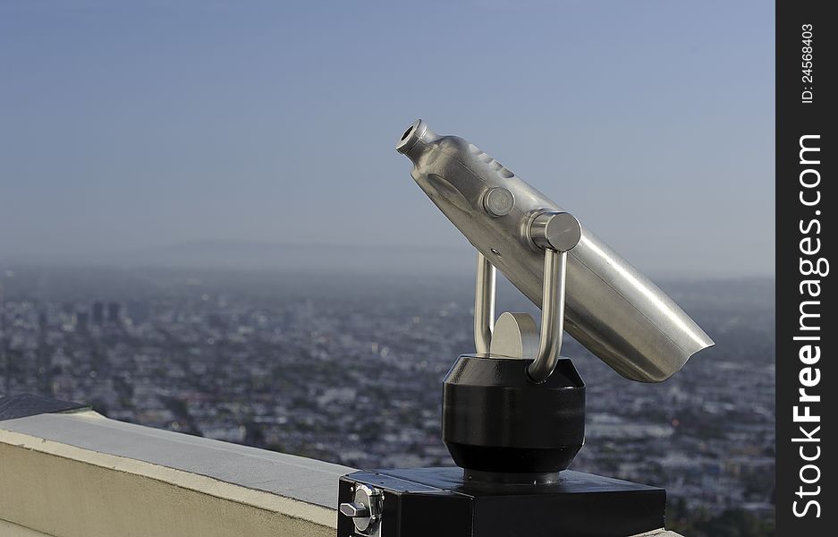 A close up of quarter binocular at a tourist location. A close up of quarter binocular at a tourist location