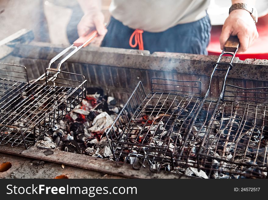 Preparation of barbecue charcoal closeup