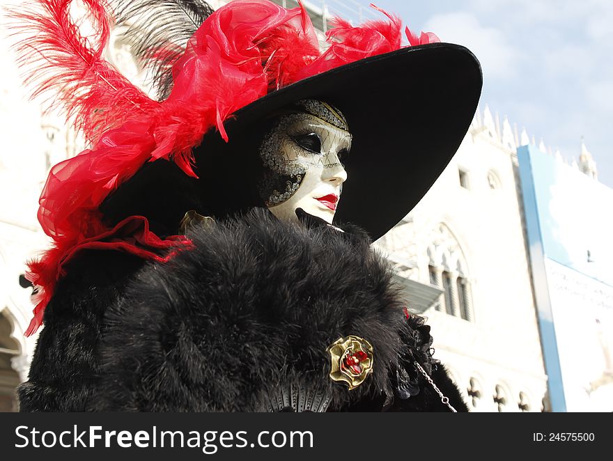 Mask of woman posing in st.mark square venice. Mask of woman posing in st.mark square venice