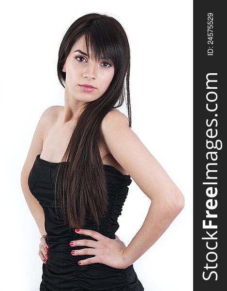 beautiful brunette in a black dres with long hair