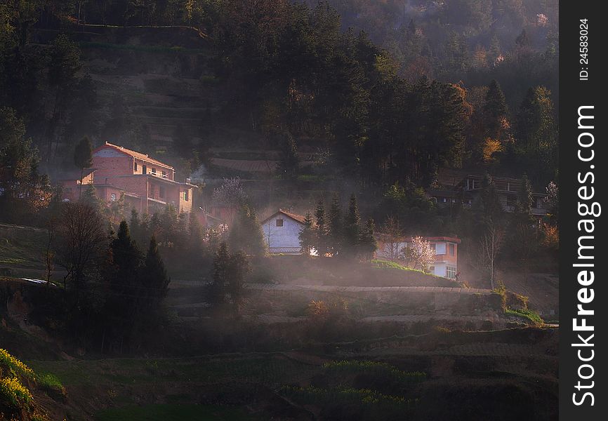 A bundle of bright sunlight on a high mountain in the farmhouse, in April 2012, in hanzhong city in shaanxi rural shooting. A bundle of bright sunlight on a high mountain in the farmhouse, in April 2012, in hanzhong city in shaanxi rural shooting.