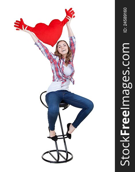 Beautiful girl with A red plush heart