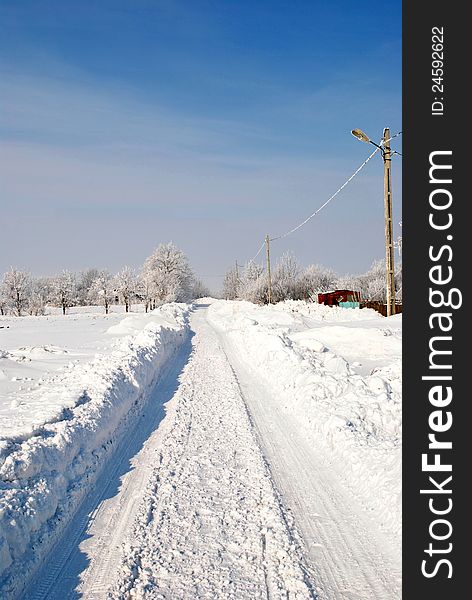 Image of a countryside road in winter. Image of a countryside road in winter