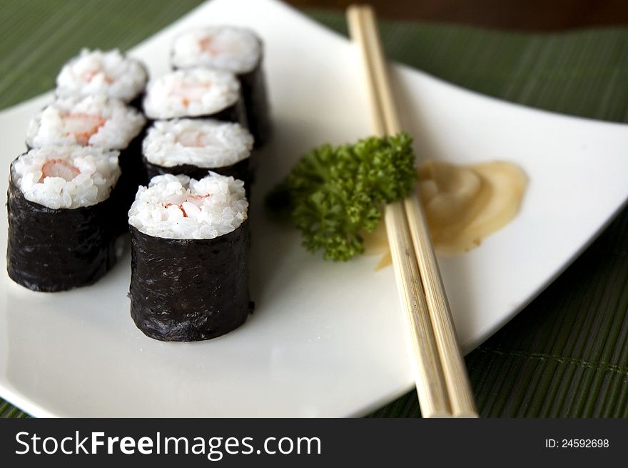 Close up sushi set on white plate