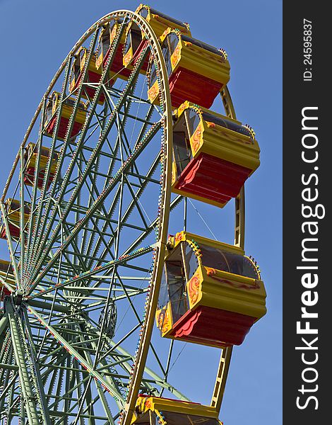 Ferris Wheel at the blue sky background. Ferris Wheel at the blue sky background.