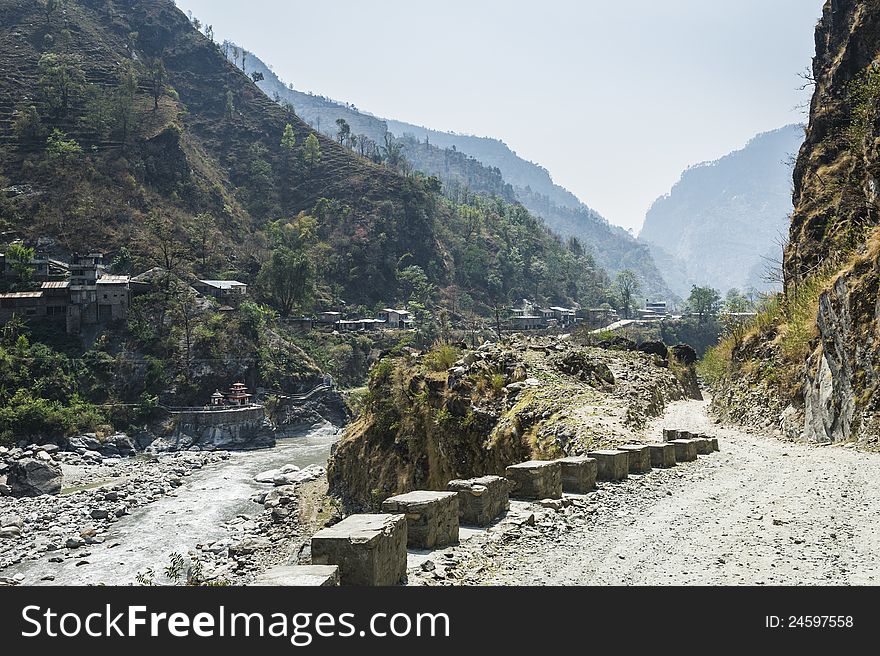Narrow road in Himalaya mountains in Nepal