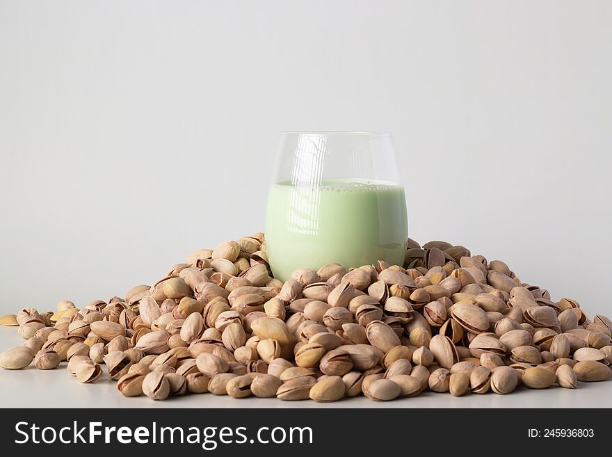 Natural pistachio milk in a glass. Alternative milk. Useful drink. Benefit for health.