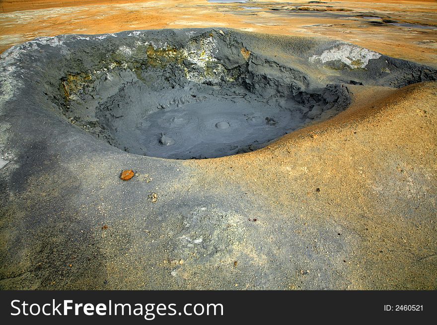 Volcanic bubbling mud pool Namaskaro Hverarond Iceland