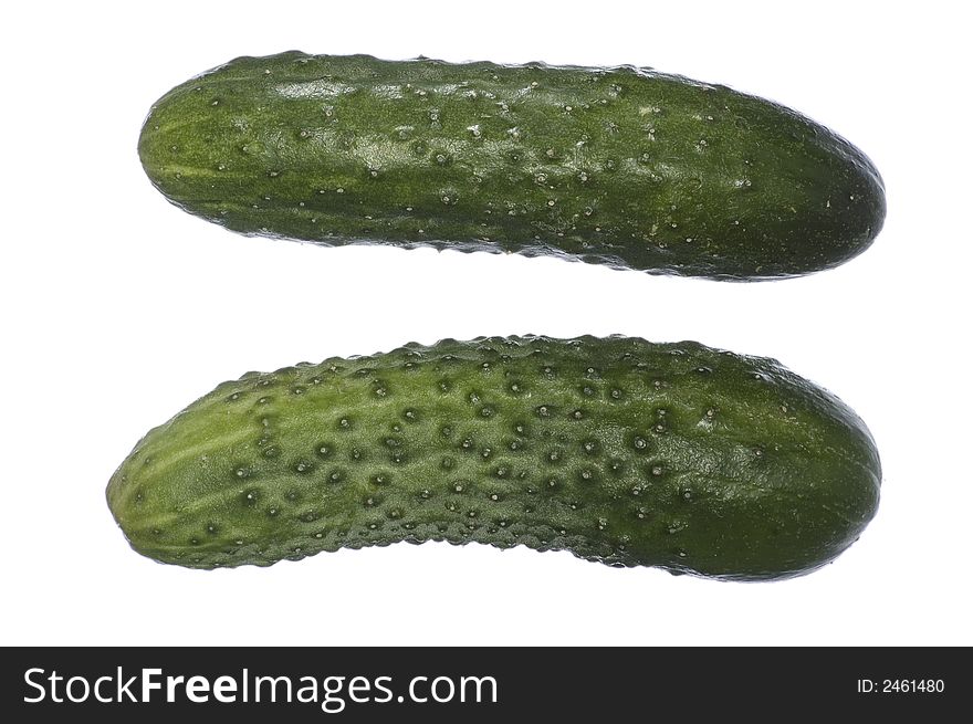 Two green cucumbers on white isolated