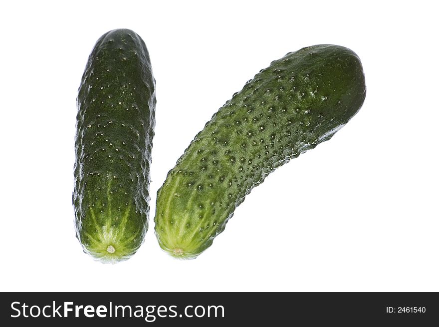 Two green cucumbers on white isolated