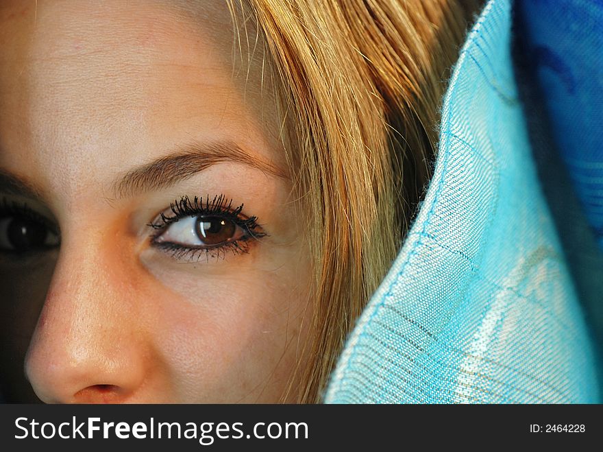 Nice female eyes behind scarf