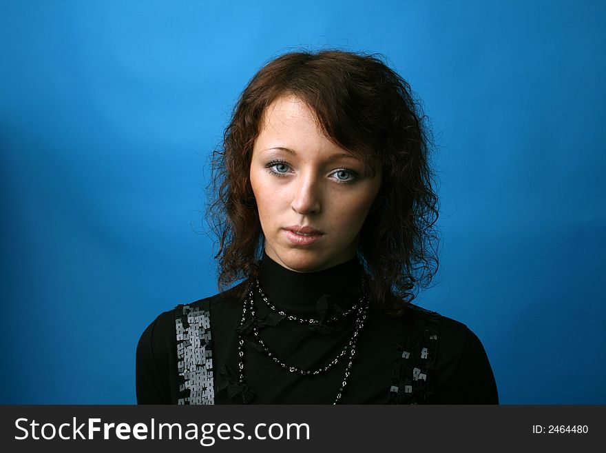 The nice girl on a blue background