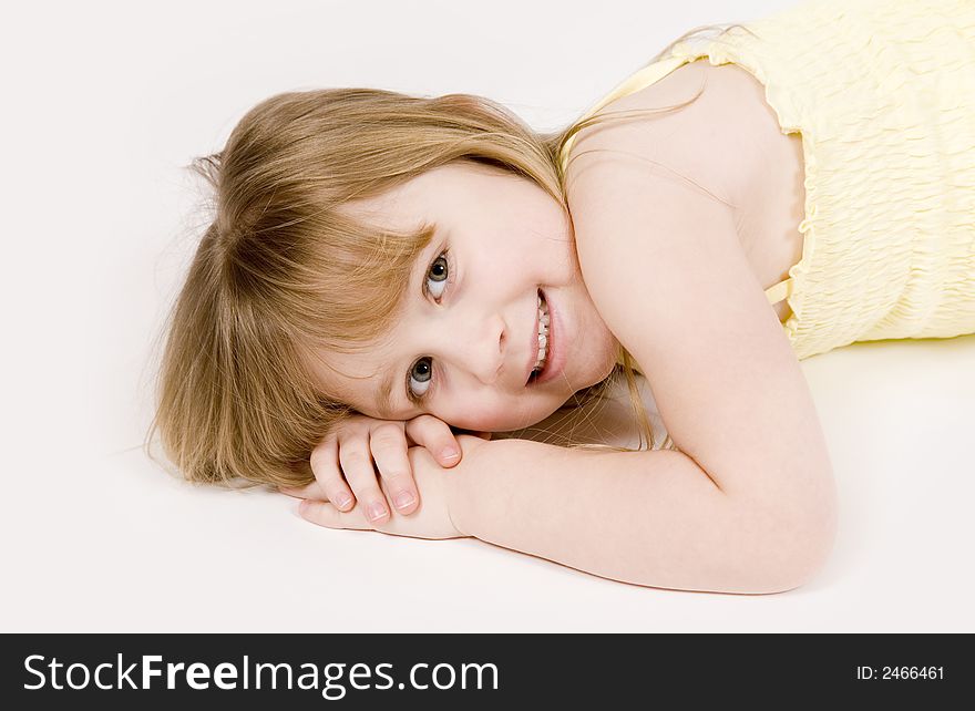 A beautiful young girl on a white background