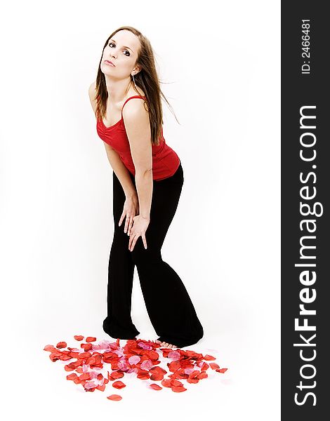 Beautiful young woman blowing kisses on white background