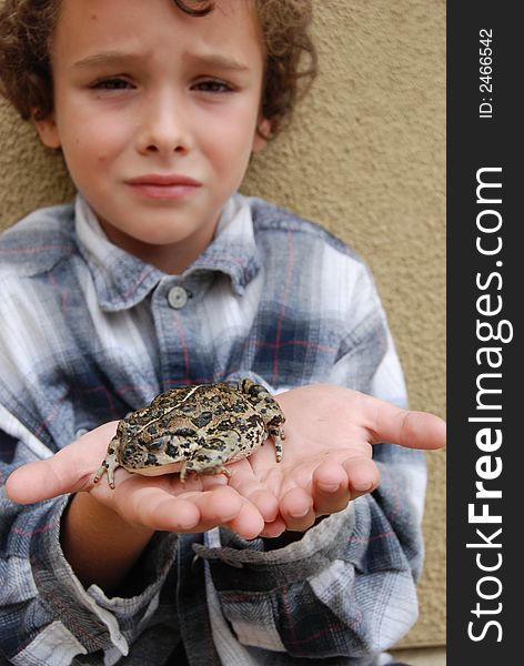 Boy Holding CA Native Toad