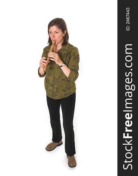 Mid-age woman playing flute over white background