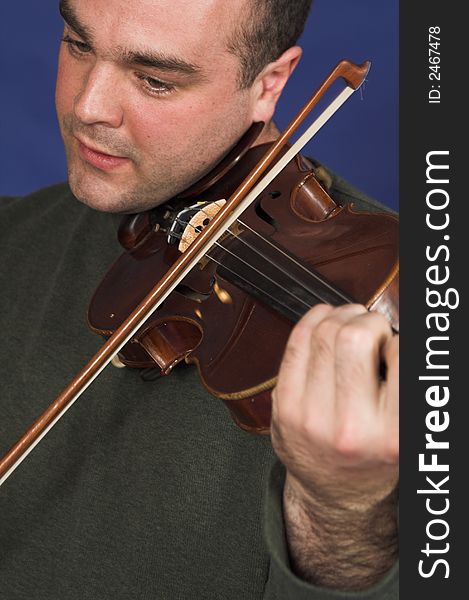 Portrait Of Man Playing Violon
