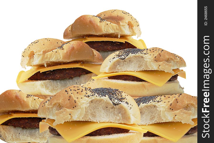 Close-up of six cheeseburgers on crescent rolls, with a clipping path. Close-up of six cheeseburgers on crescent rolls, with a clipping path.