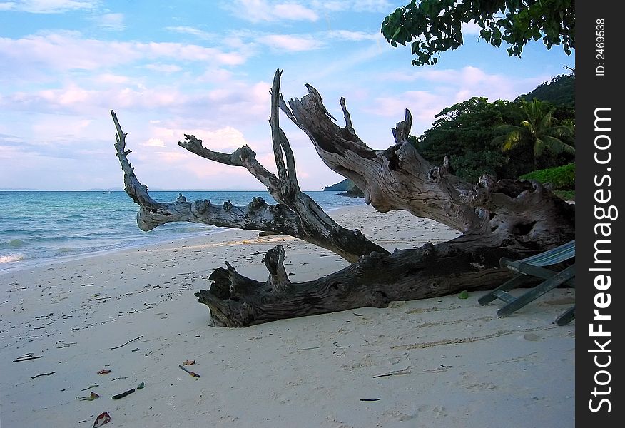 A view from Laem Ton beach in Koh Phi Phi Don, Thailand. The peaceful Indic ocean bathes the shore. A view from Laem Ton beach in Koh Phi Phi Don, Thailand. The peaceful Indic ocean bathes the shore.