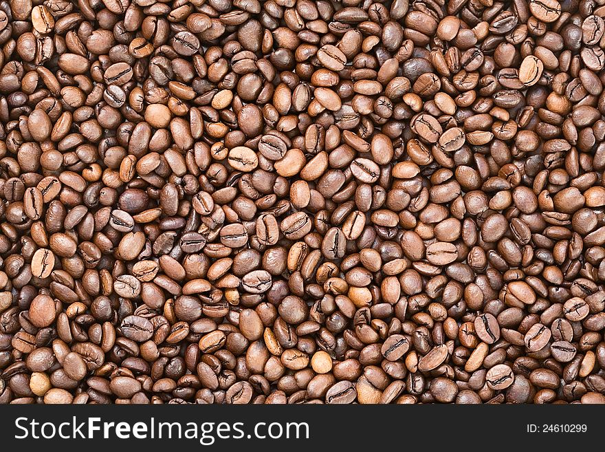 Natural coffee beans textured background. Natural coffee beans textured background