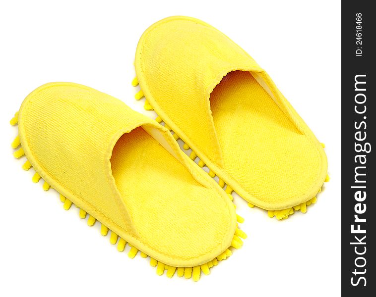 Yellow slippers isolated on a white background