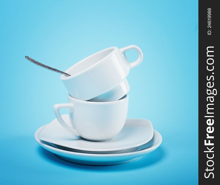 Two cups on a blue background