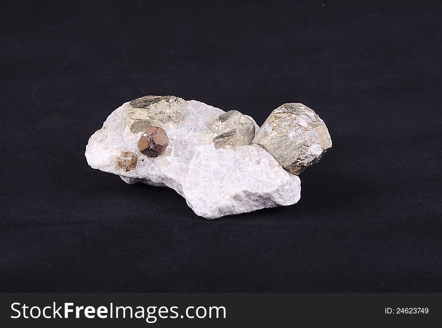 Natural pyrite crystal octahedral mine in Sardinia, Orani. Mineral sample on rock.