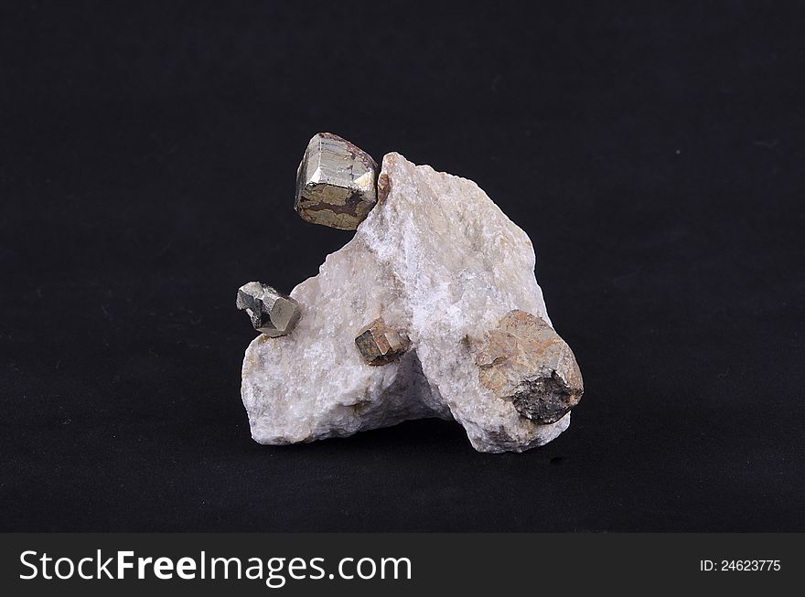 Natural pyrite crystal octahedral mine in Sardinia, Orani. Mineral sample on rock.