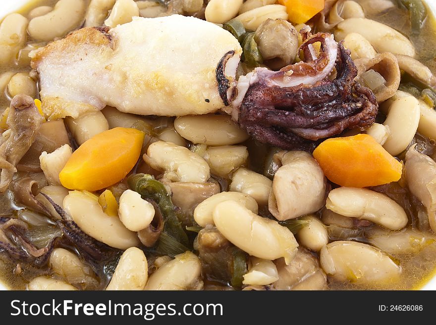 White kidney beans soup in decorated dish. White kidney beans soup in decorated dish