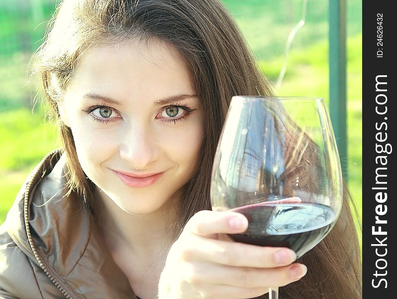 Red wine. Woman drinking red wine