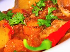 Beef Goulash With Potatoes, Beef, Tomato Sauce, Parsley And Hot Peppers Stock Image Beef Goulash With Potatoes, Beef, Tomato Sauce, Parsley And Hot Peppers Stock Image