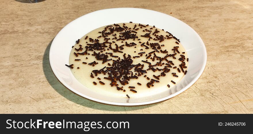 Milk gray with chocolate flakes sprinkled on top