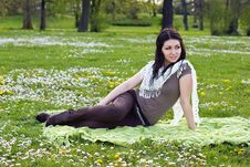 Beautiful Girl Sitting On The Plaid In The Park Royalty Free Stock Image Beautiful Girl Sitting On The Plaid In The Park Royalty Free Stock Image
