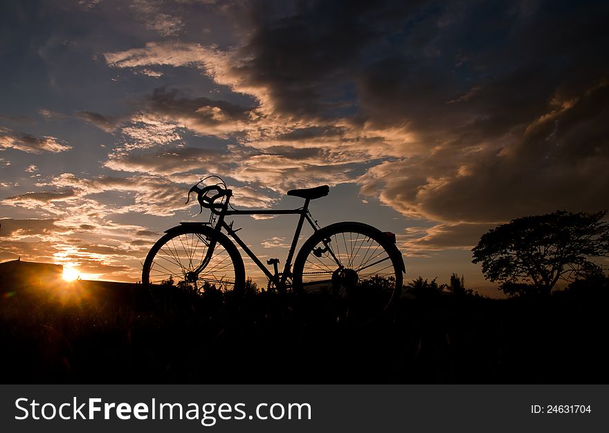 Silhouette of bike on sky