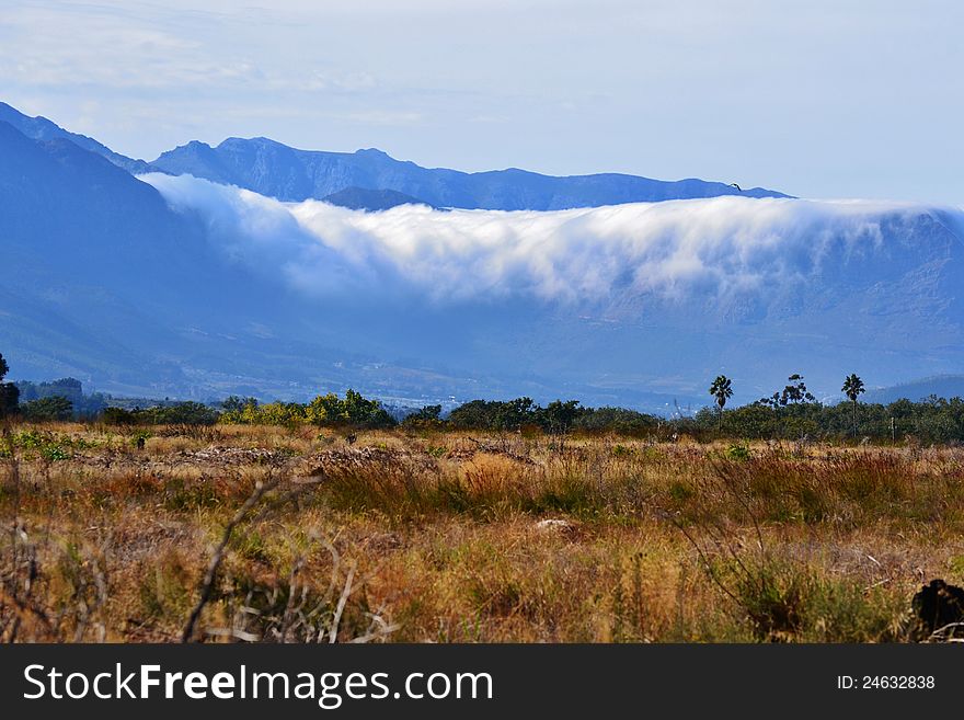 Mountains In Clouds