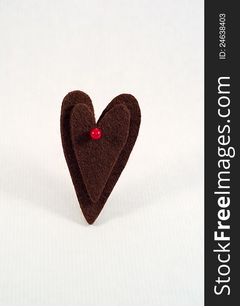 Double felt heart with red pearl