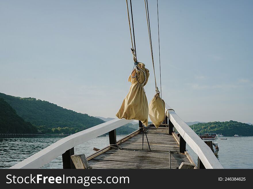 the sails of the folded boat. The ship docked. preparation for sailing. the sails of the folded boat. The ship docked. preparation for sailing.