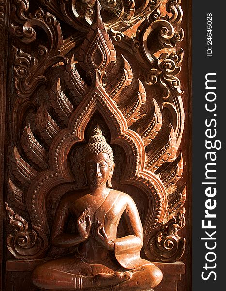 Wood crave buddha image
