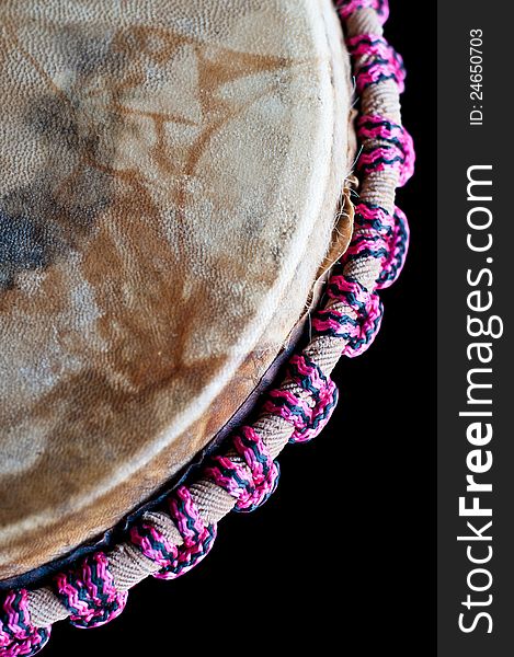 Close up of the djembe isolated on black background. Close up of the djembe isolated on black background