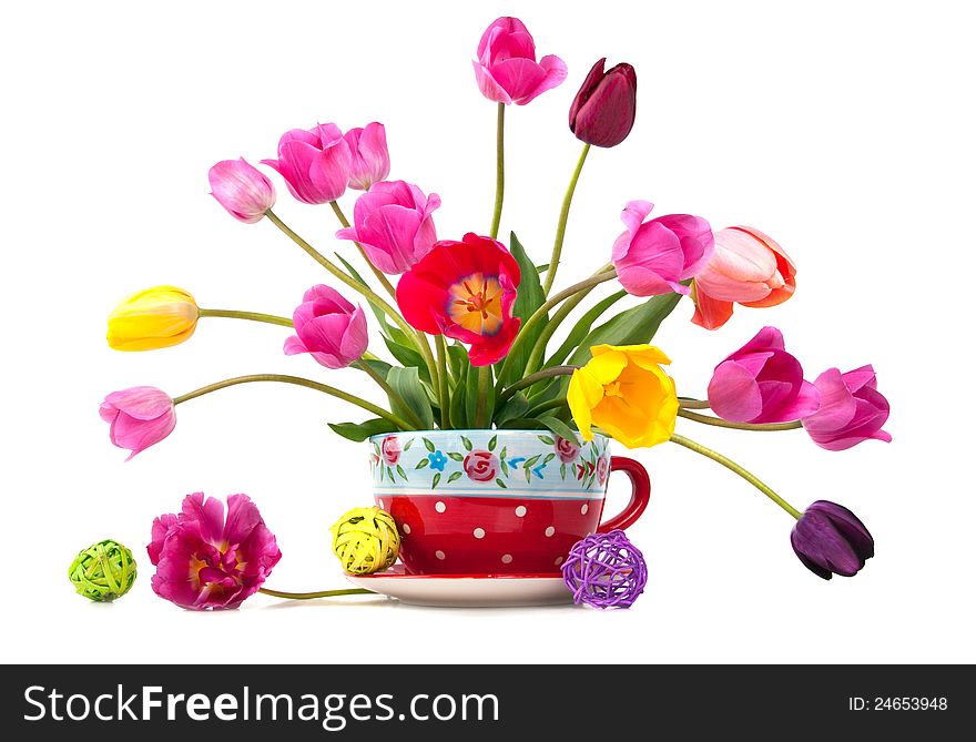 Beautiful bouquet of tulips in a red cup. Beautiful bouquet of tulips in a red cup