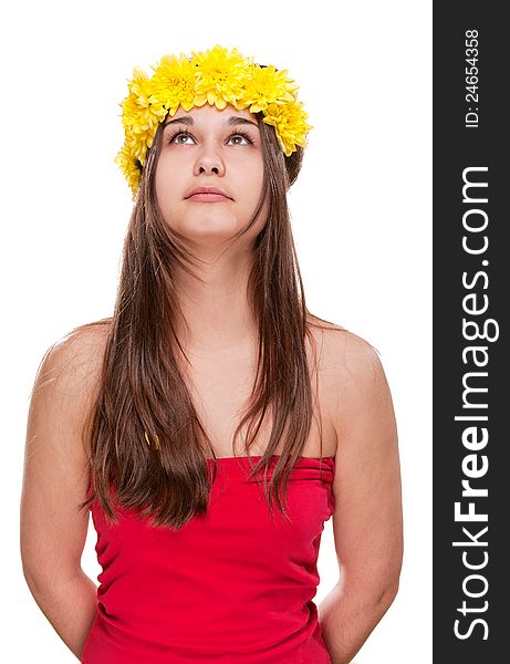 Girl in daisy wreath looking up