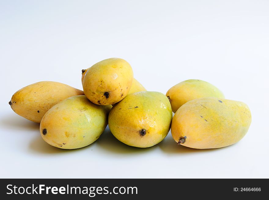 Pile of ripe mangoes, Asian fruit in summer season