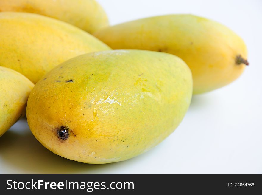 Close up of mangoes pile, Asian fruit in summer season