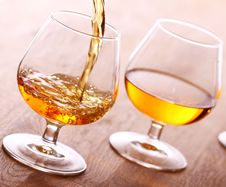 Pouring Cognac Into The Glass Stock Images Pouring Cognac Into The Glass Stock Images