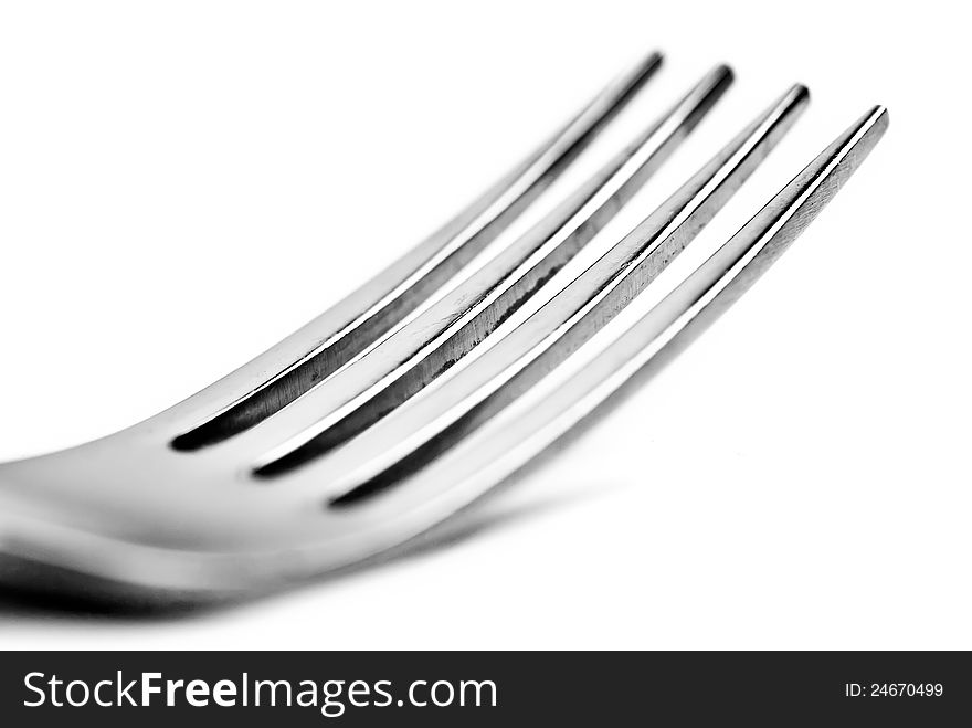 Closeup of the tines of a dinner fork. Closeup of the tines of a dinner fork.