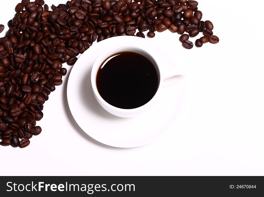 Cup of black hot coffe over white background