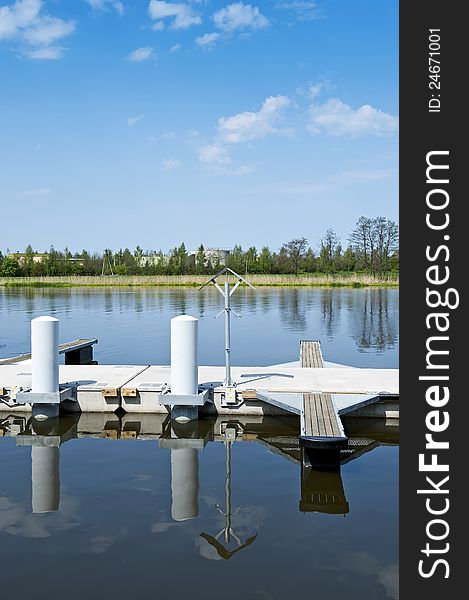 View of the empty jetty by the lake.