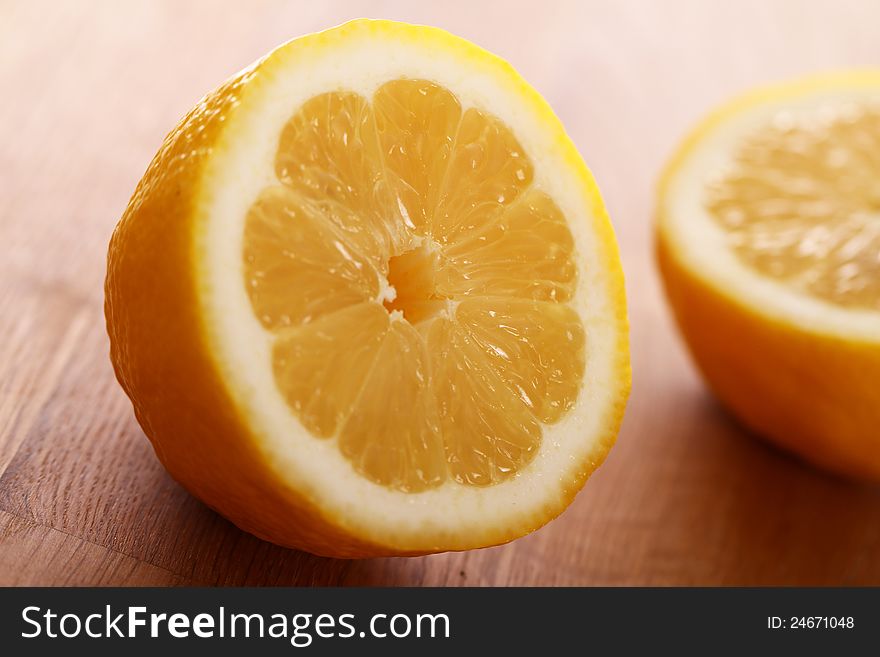 Close up of fresh lemons on wooden board
